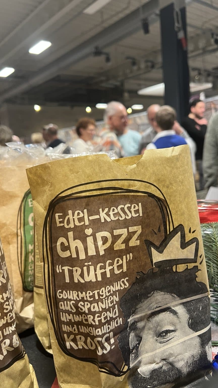 Branded tasting stand - Premium potato crisps in a real retail setting